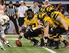 MIZZOU WINS COTTON BOWL Page 16 Page 17 Arlington, Texas In concluding a Cotton Bowl game filled with twists, drama and recordbreaking accomplishments, it was fitting that Mizzou s 41 31 win over