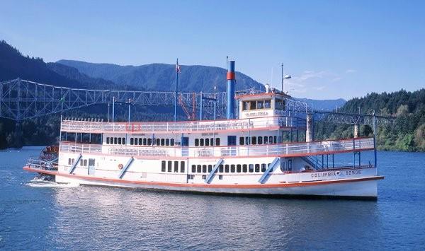 TOUR INFORMATION COLUMBIA RIVER GORGE WATERFALLS WITH A RIVERBOAT CRUISE Pick up at The Heathman Lodge in a tour bus luxury liner with a driver and a guide all the way.