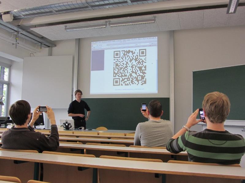 Figure 4: The QR code is displayed on the screen during a lecture. kind of data, it is especially useful to represent a link to a web page.
