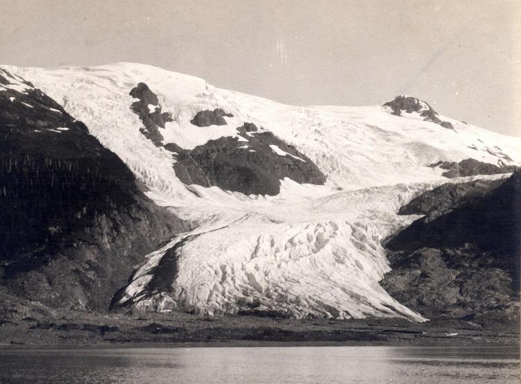 GLACIERS, THEN AND NOW Toboggan Glacier, Alaska June 29, 1909 Photo by Sidney