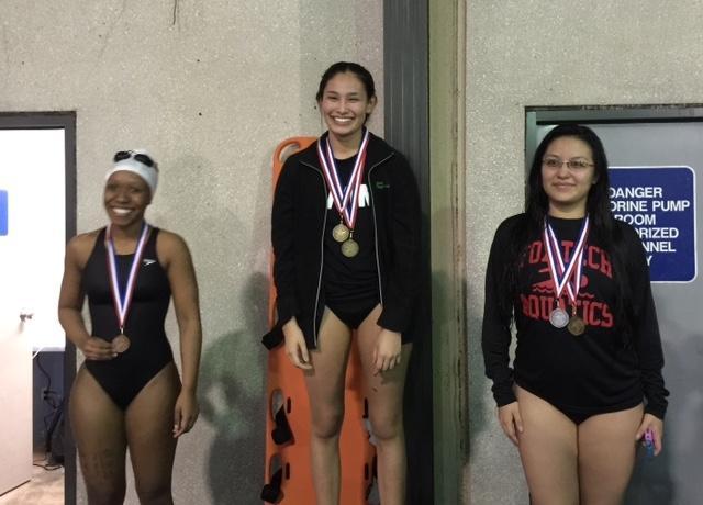 During the awards celebration, our Fox Tech swimmers tossed their swim coach into the pool. Coach Cuccia said that her clothes were so water-logged that she needed help getting out of the pool.