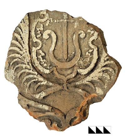 3). Archaeologists hope to locate the remnants of Orlyk s residence at the site where this heraldic tile was found.