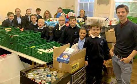 Pictured are some of our Bourne students with the amazing food contributions for