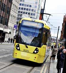 Destination INTO Manchester 11 Manchester Central Library Old Trafford Stadium Metrolink tram system HISTORY AND ARCHITECTURE With beautiful historic buildings like the Town Hall representing the