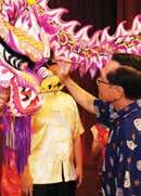 The dragon dance was excellent and Colonel Swee and Mr Mah painted the eye on the dragon.