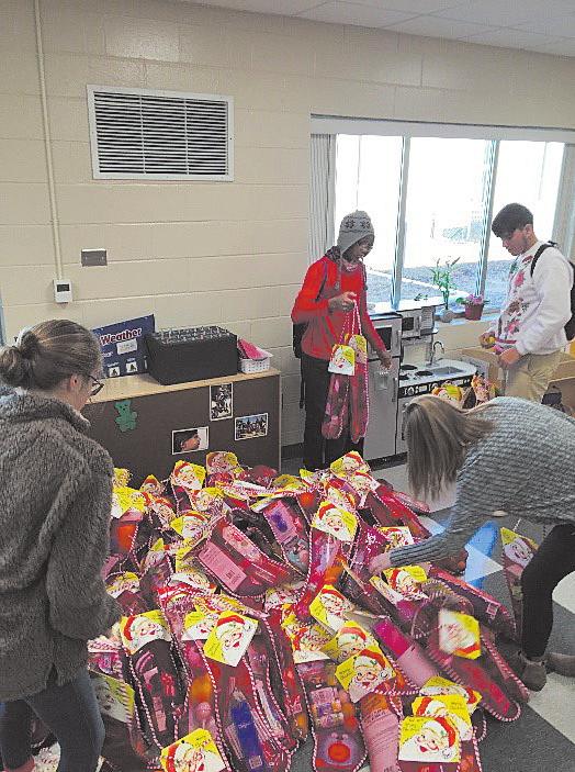Houston County High School Family, Career and Community Leaders of America (FCCLA) members embraced the true meaning of giving to those in need during the recent holiday season.