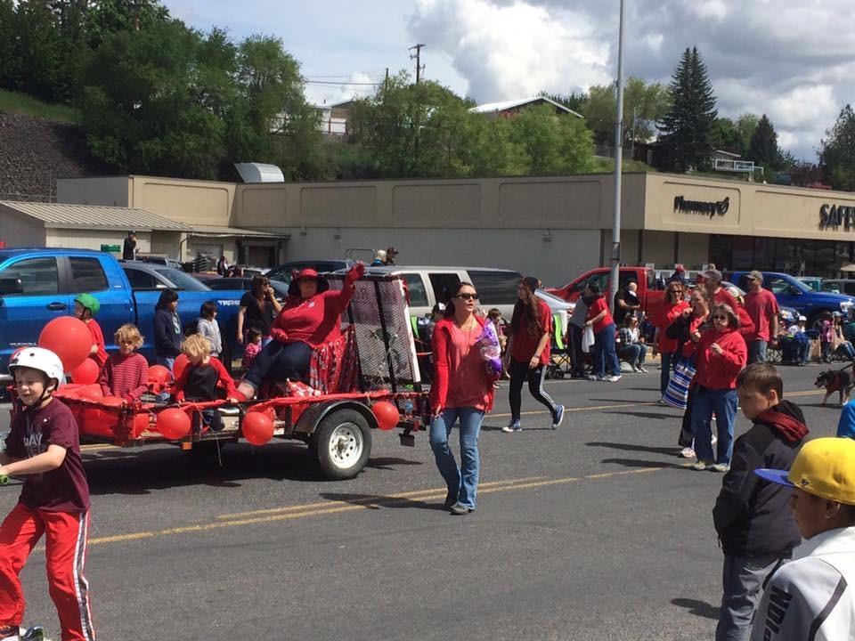 Grand Coulee EA members parade down Main Street in their McCleary