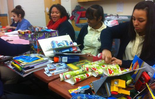 As they did last year, the Girls Club conducted a toy drive, wrapped all the presents and then delivered them to the