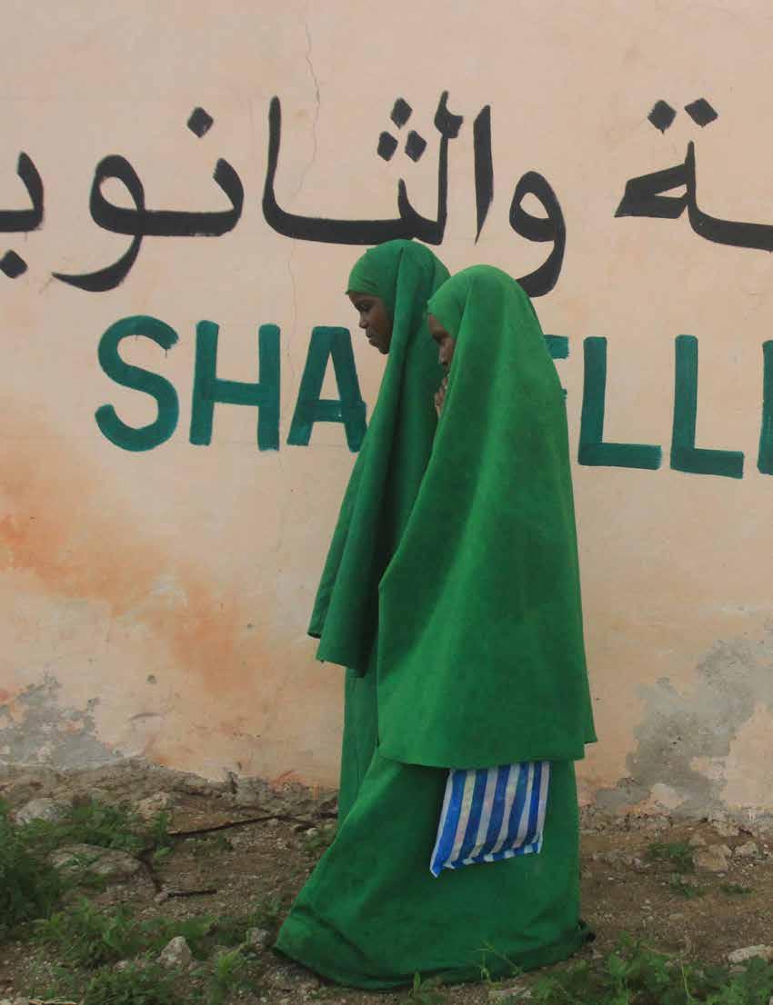Somali students walk to attend classes at Shabelle Boarding