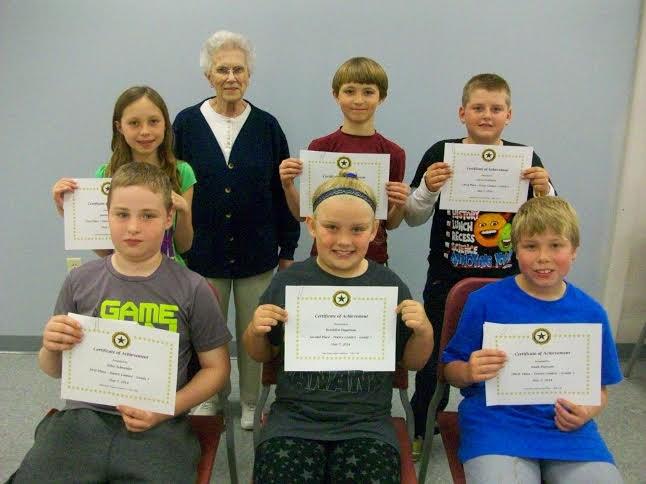 Darleen Duffy presented the American Legion Auxiliary poetry, essay and poppy poster