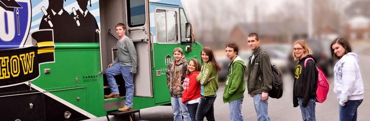 Green County High School students pose with the College Info Road Show mobile classroom.