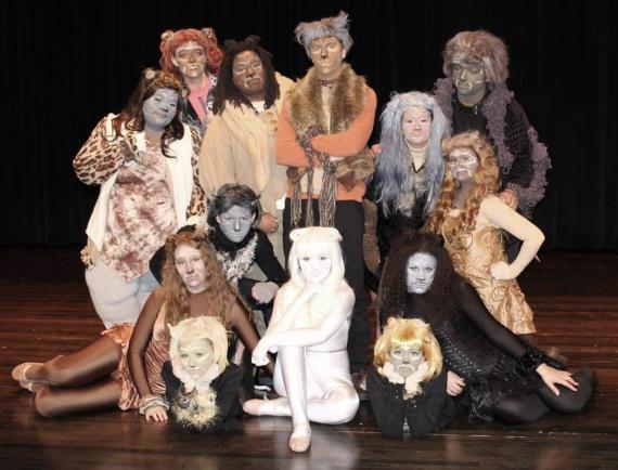 Elementary students filled roles as kittens.