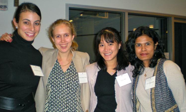 This page, right: At the 2011 Harvard Business School (HBS) Project Fair (from right) Scholars Dr. Subbu Trikudanathan, Dr. Nancy Wei, and Dr.