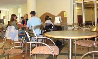 Internet cafés create an informal collaborative environment. Cafés often include both a wireless environment for laptops and a few computer workstations configured for guest login.