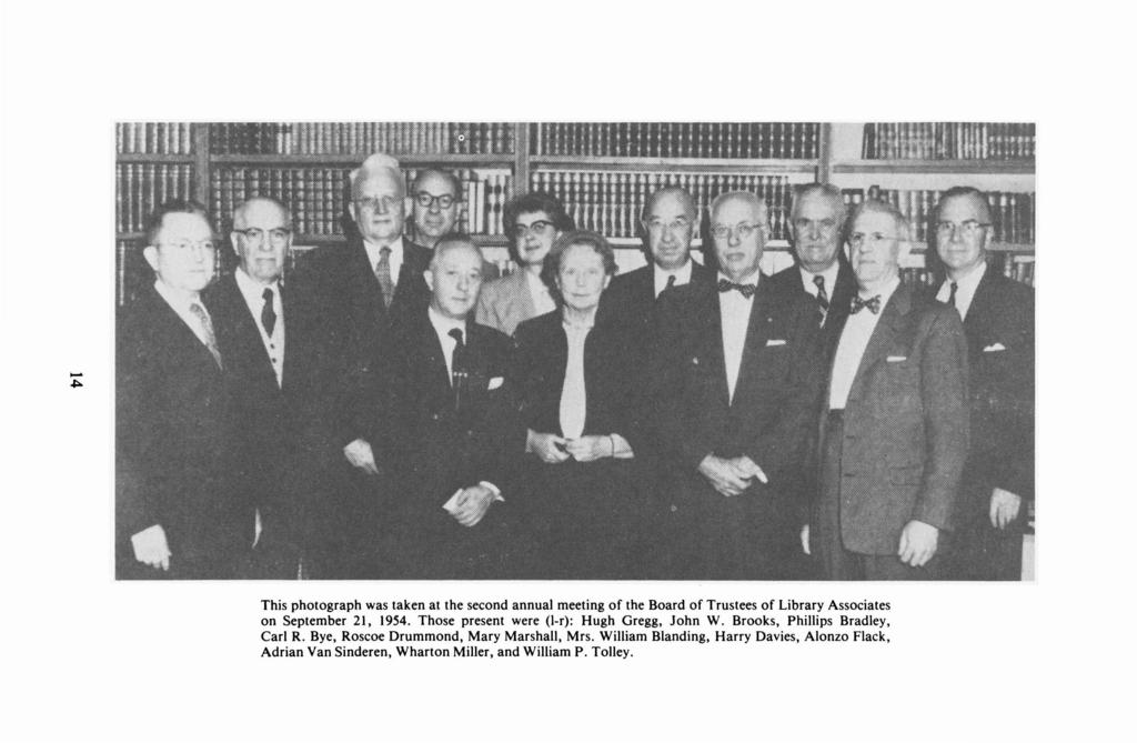 This photograph was taken at the second annual meeting of the Board of Trustees of Library Associates on September 21, 1954. Those present were (I-r): Hugh Gregg, John W.