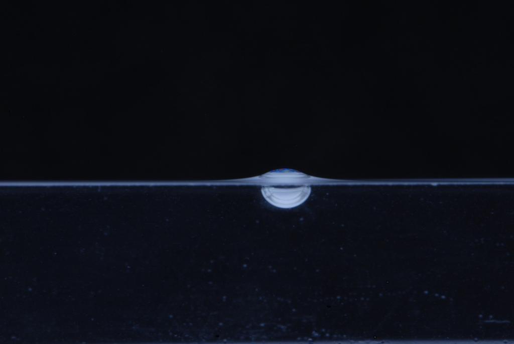 bubbles floating at an air-water interface