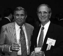 James Leonard ( 63) (left) reminisces with classmate Gene Miller ( 63) Maurice Bercier (