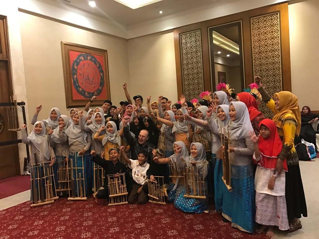 IAPMO Group CEO Russ Chaney with children in Indonesia who performed a special song in honor of World Plumbing Day.
