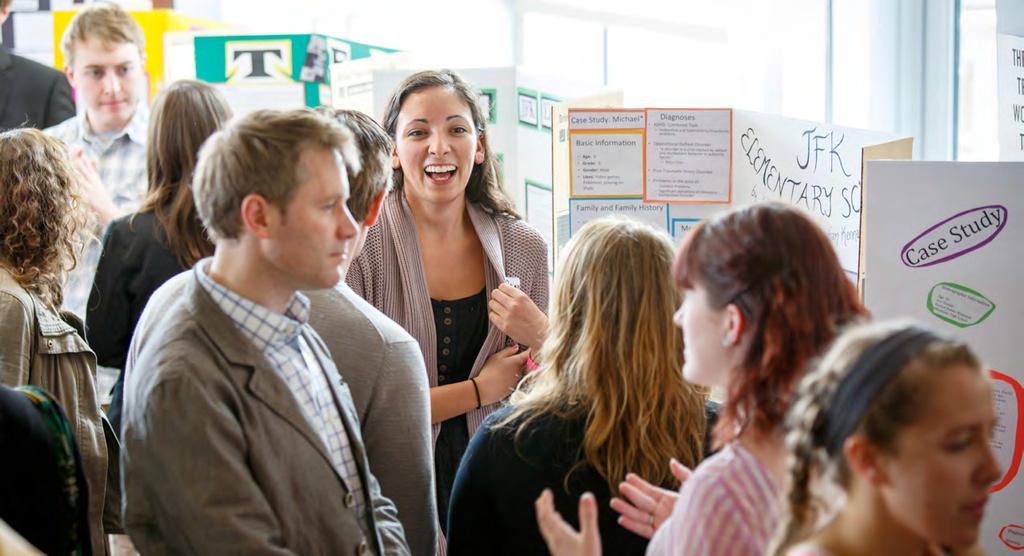 Students, alumni and faculty at a recent annual campus-wide Academic Symposium, where graduating seniors present their research and creative work.