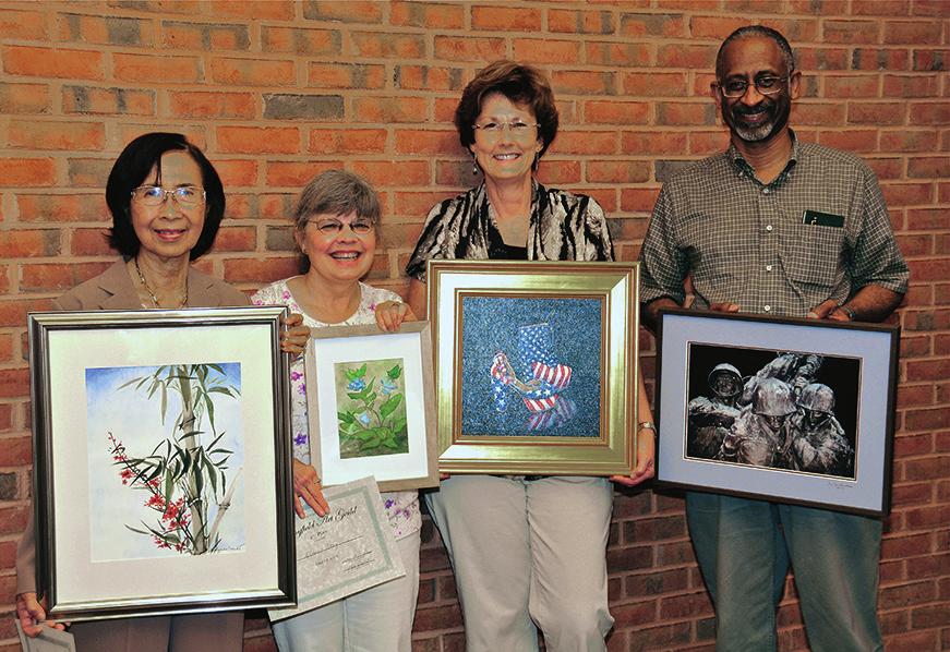 This year s highly talented winners, seen in this picture, left to right, are Trinh Nguyen, Honorable Mention (watercolor), Elaine Sevy, Third Place (watercolor), Lydia Jechorek, First Place(oil) and