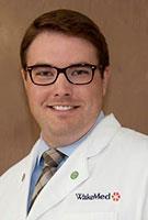 Chris McGuire, PharmD, BCPS, is the current Pharmacy Clinical Coordinator for Cardiology at WakeMed Health & Hospitals.