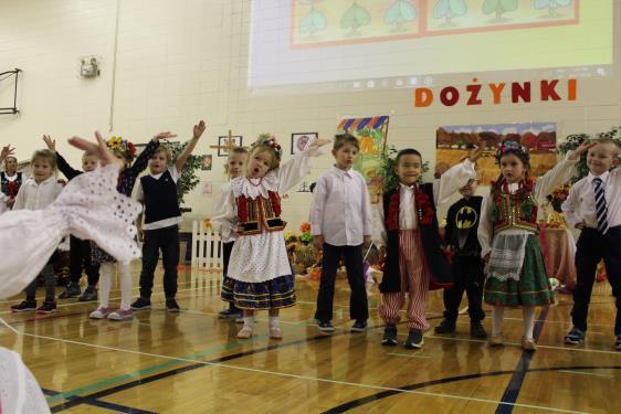 Dozynki On October 6, the students and staff of Sw. Jan Pawel II held its annual Dozynki celebration.