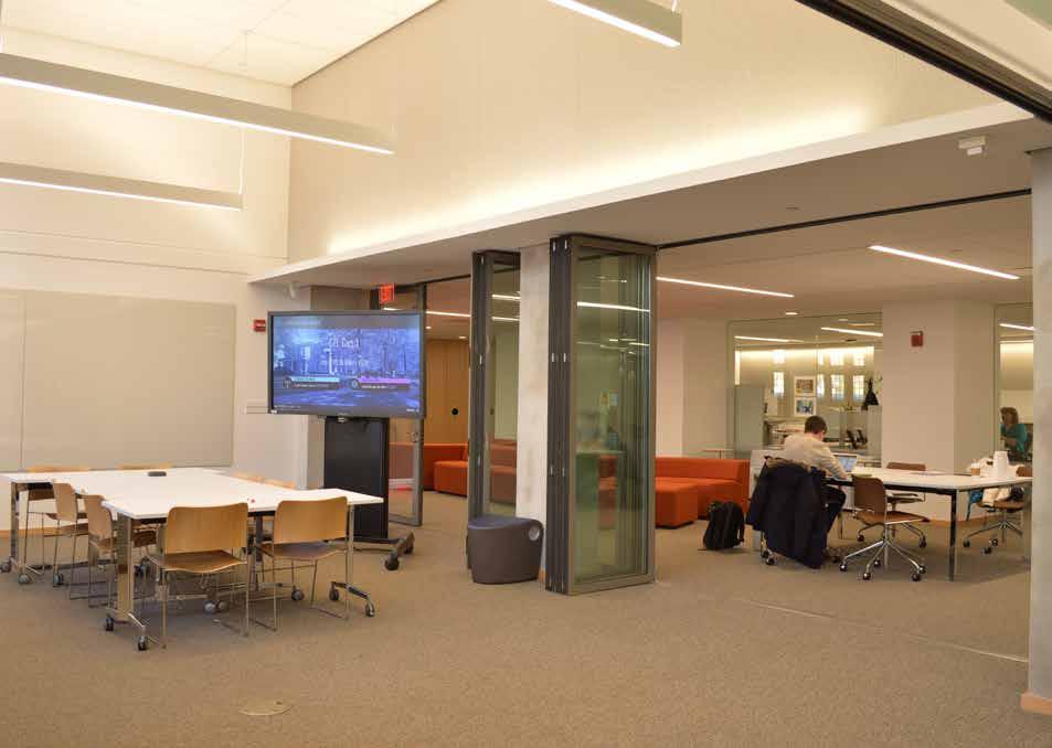 Retractable walls in two classrooms can be closed to create discrete areas for
