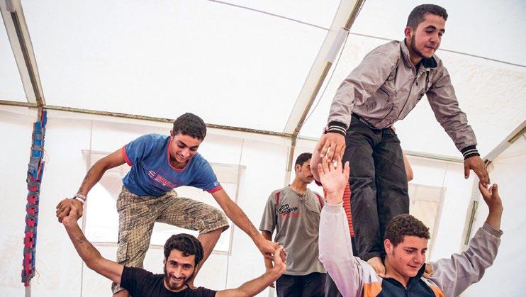 6 At the Zaatari refugee camp, FCA supports a circus school for both young men and women.the aim is to improve the wellbeing of distressed young people.