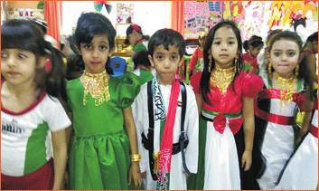 The Kindergarten was alive wi hues of green, black, red and white, UAE traditions, customs, values and heritage, especially e national dress, while expressing eir dedication towards e