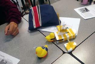 The boats had magnets attached to them, as well as rubber ducks, in a pool of water (see photos).