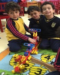 We built trains, airplanes and boats using various construction materials and learnt how to use our English to communicate and plan together how to position and