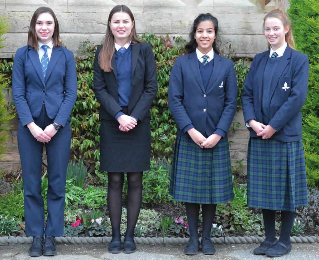 Girls 1. Uniform required by girls in the Sixth Form Girls in the Sixth Form wear a skirt or trouser suit of formal, conventional design. The suit must be plain dark or navy blue, dark grey or black.