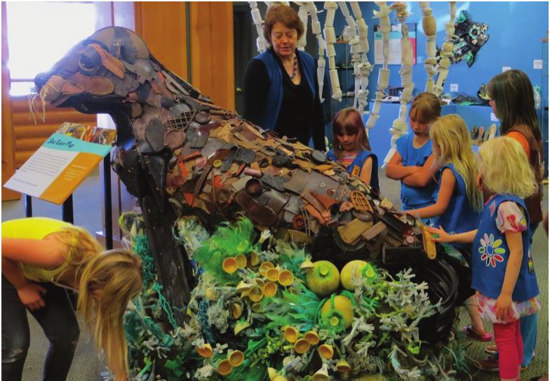 During our exhibit at the National Zoo, the zoo trained docents who stood by sculptures to deliver a message to viewers.