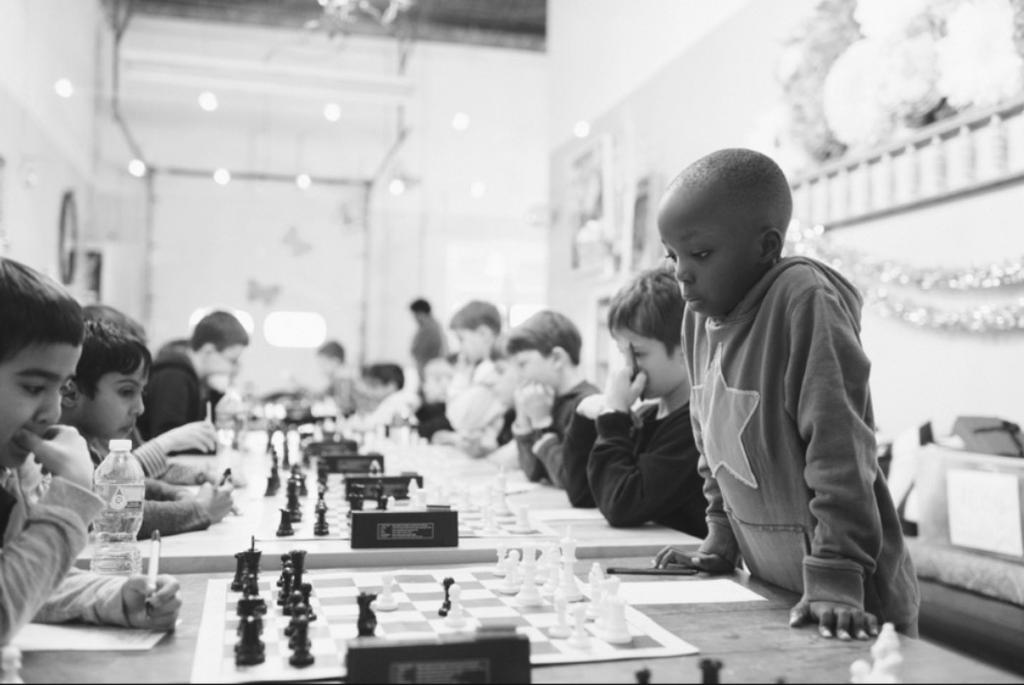 In Tournament Training, every week students play a game against a player close to their skill level. The game is then analyzed in a group setting with a highly-rated chess coach and peers.
