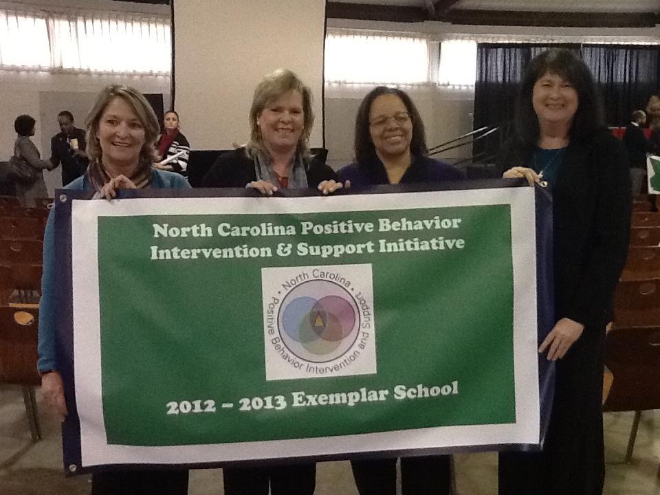 Page 4 South End Elementary- Exemplar Banner Pictured: (L to R) Scottie Penn, Instructional Coach; Lisa Moore,