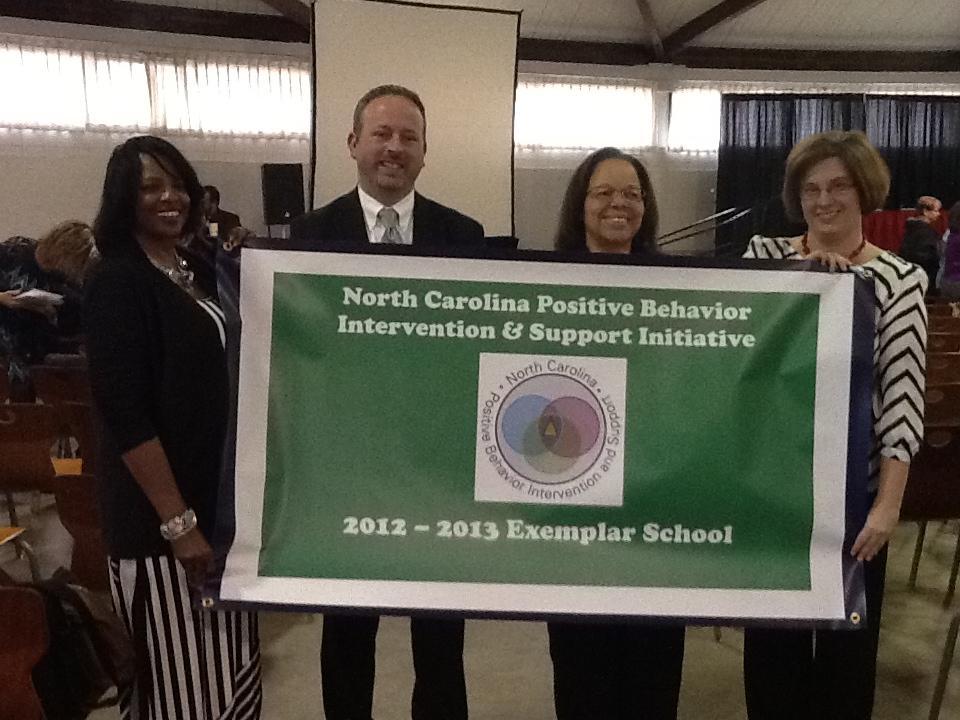 Page 5 Draper Elementary- Exemplar Banner Pictured: (L to R) Mironda Williams, School Counselor, Russell Vernon,
