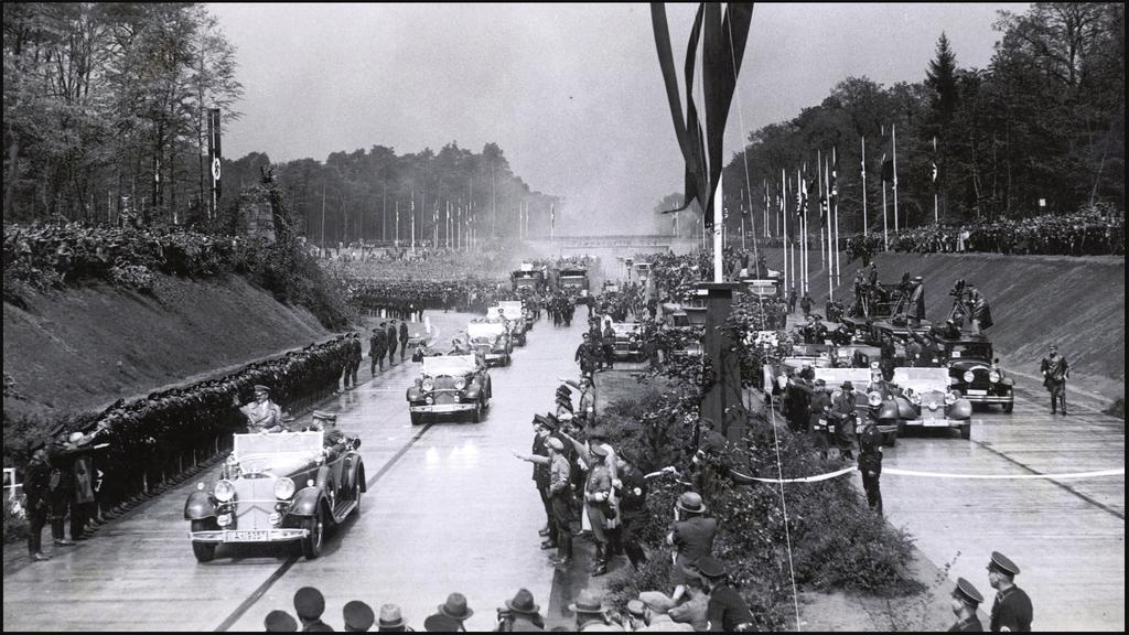 9 SOURCE C A photograph taken in the mid-1930s. It shows celebrations to mark the opening of a new Autobahn. SOURCE D I went to see the minister in charge of labour.