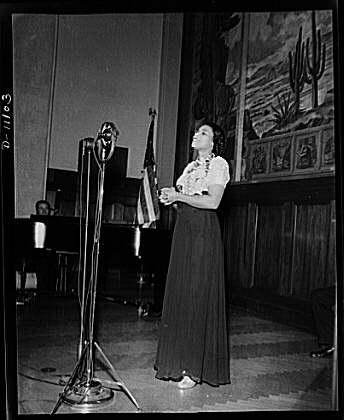3. Image Marian Anderson broadcasting a speech at the dedication of a mural installed in the United States Department of the Interior building,