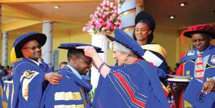 SCHOOL OF ENGINEERING, ENERGY AND THE BUILT ENVIRONMENT - engineering.mku.ac.ke, seebe@mku.ac.ke Chancellor Prof. Victoria Wulsin confers a Doctoral degree to one of the graduands at a past ceremony.