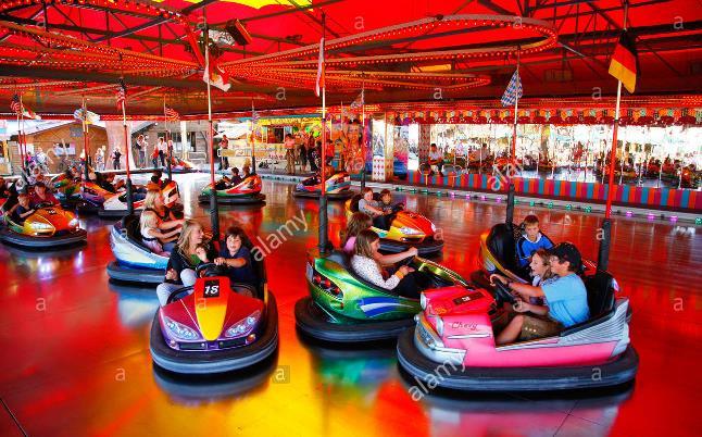 Science at Amusement Parks Why does each bumper car have a bar sticking out of it?