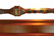 The seven krises (traditional Malay weapon) represent the nations participating in the international medical consortium. The songket motif symbolises the country s cultural tradition.