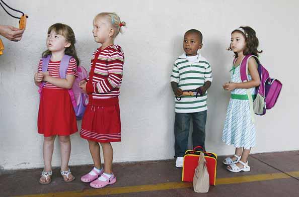 m. 7 p.m. Free Nail Care Box For All New Clients NORBERT VON DER GROEBEN Left to right: is Amy Chang, Angelina Boyrak, Tyler Thomas and Jessica Villarreal wait in line to enter kindergarten at