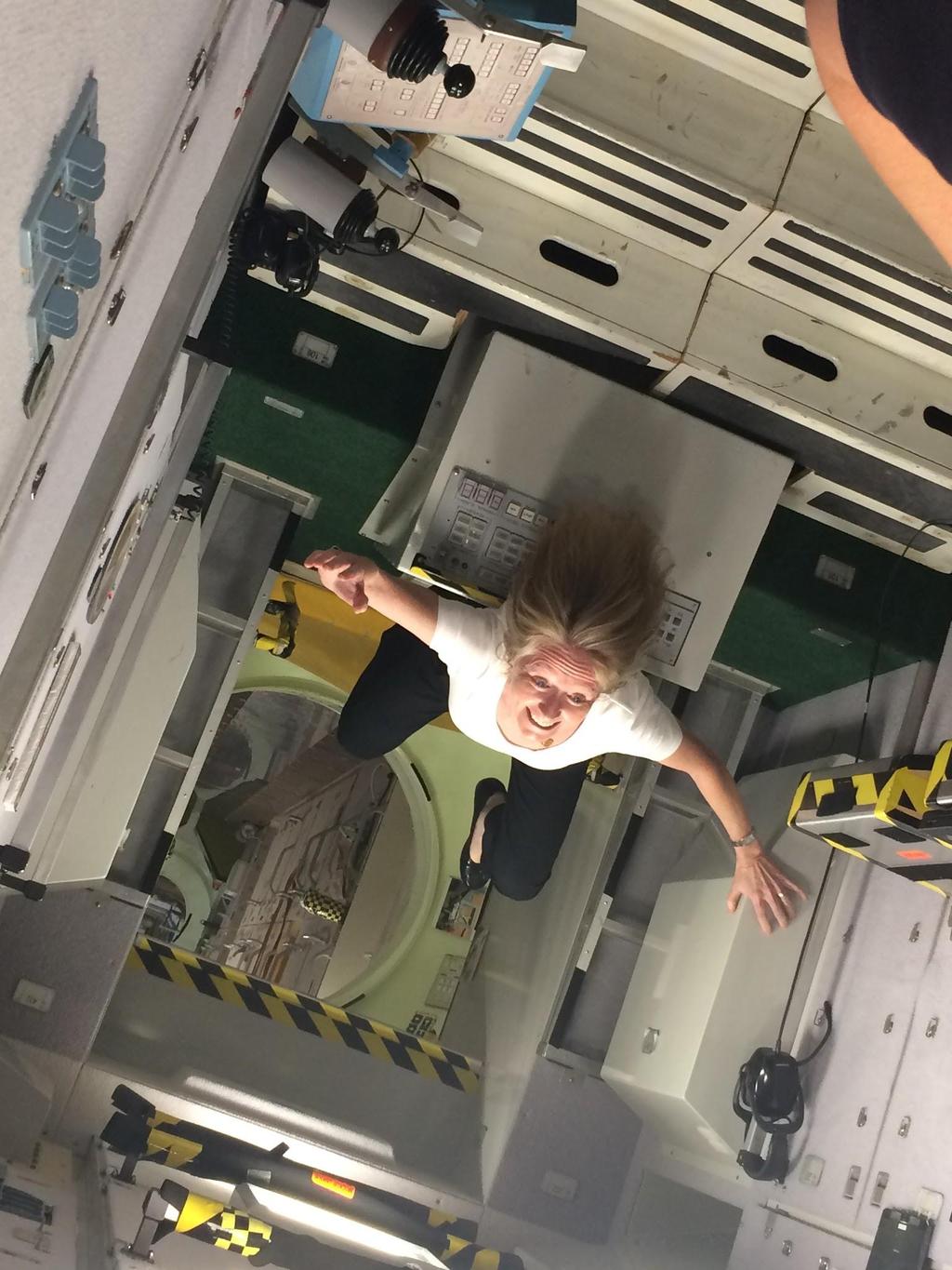 Ph.D. enjoys free floating during a NASA visit.