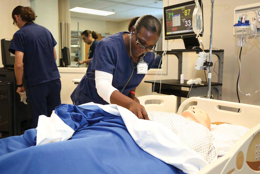 Latoya practices her nursing skills on state-of-the-art equipment in the new Strawberry Plains Campus nursing lab.