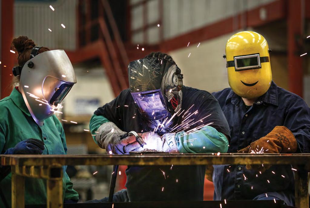 The classroom gets hot and sparks fly when students light up their welding torches.