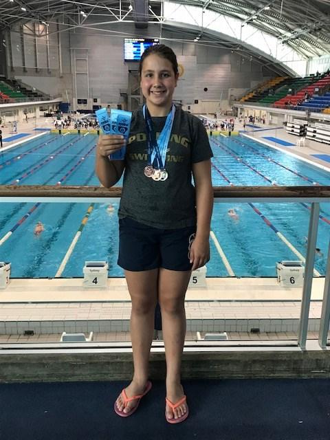 CONGRATULATIONS ASPEN Aspen represented St John s Primary at NSW PSSA Swimming Championships Sydney held at Olympic Park Aquatic Centre on the 11th and 12th April.