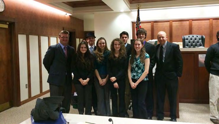 Bedford High School Mock Trial Team: First-Year Success By Bill Higgins Jr. Bedford County District Attorney Bill Higgins Jr. (left) is shown with the Bedford High School Mock Trial team.