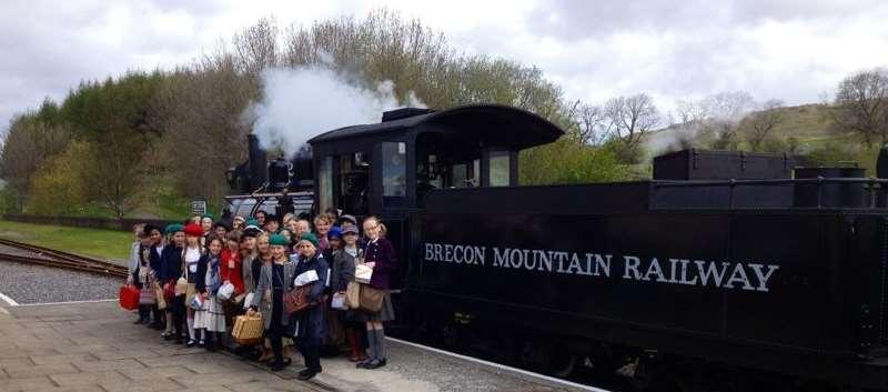 They travelled on a steam engine dressed in 1940s clothing, sung songs of the age and ate a rationed lunch to bring the period vividly to life and to make comparisons between modern and WW2 times.