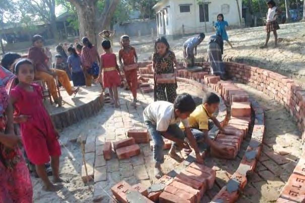 Outdoor as Learning Environment for Children at a Primary School of Bangladesh 72 Figure 45: Class IV children are working for their outdoor class The construction works have been gone throughout the