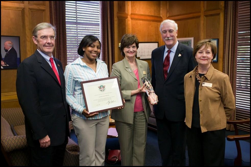 From Left are Vice Chancellor Neil Mathews; Raquel Henry, president, Service-Learning president, Service-Learning Student Advisory Council; Shoemaker; O Keefe; and Roxanne Dill, CCELL